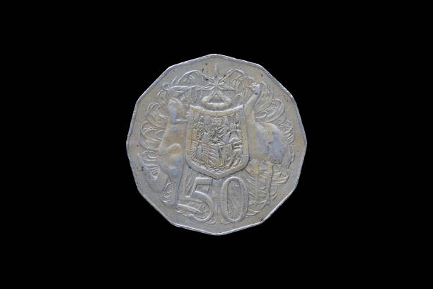 istock Half australian dollar coin isolated on black background. 687909862