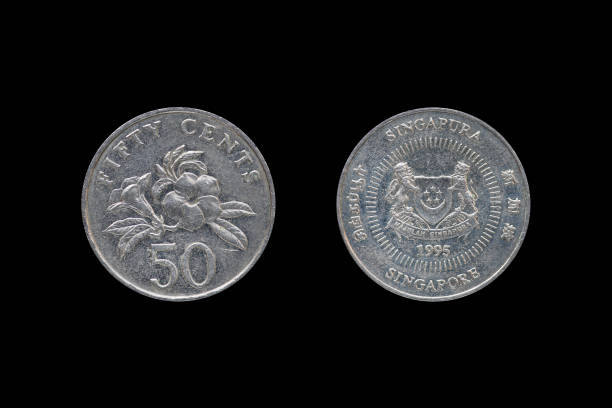 istock Singaporean 50 cent coin year 1995 isolated on black background. 687912086