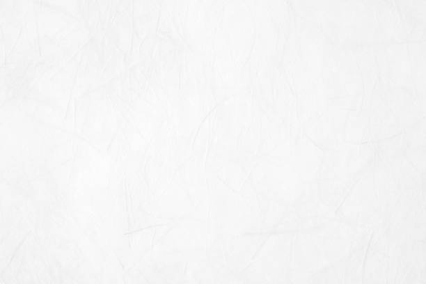 istock White mullberry paper textured background, detail close-up 687915744