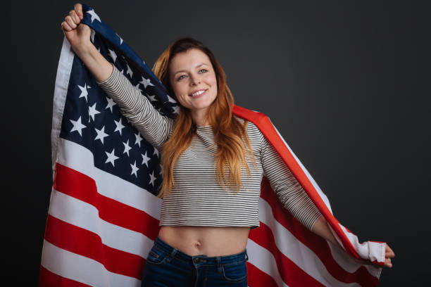 Sincere inspiring woman feeling patriotic