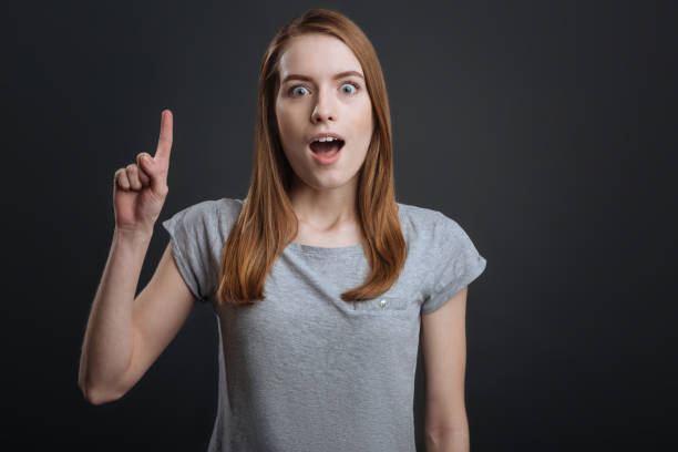 istock Smart enthusiastic girl sharing interesting information 687923118