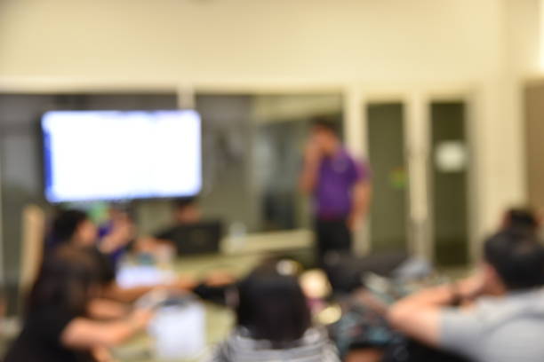 istock Abstract blur student and people meeting  in university. 687928976