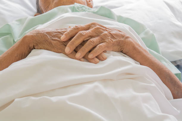 istock hospital patient hands to care 687931340