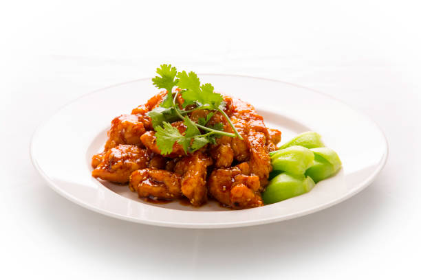 sesame chicken a dish chinese sesame chicken on white isolated background teriyaki stock pictures, royalty-free photos & images