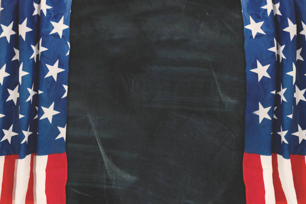 istock Curtains of an American flag with a blackboard 687937202