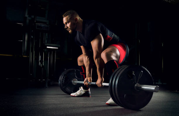 istock Athlete is prepared to perform an exercise called deadlift 687939482