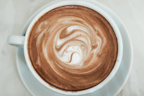 istock hot cocoa and milk foam 687940270