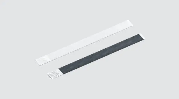 Photo of Blank black and white paper wristband mockup