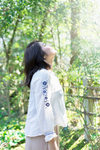 istock Young woman relaxing in outdoors. 687951212