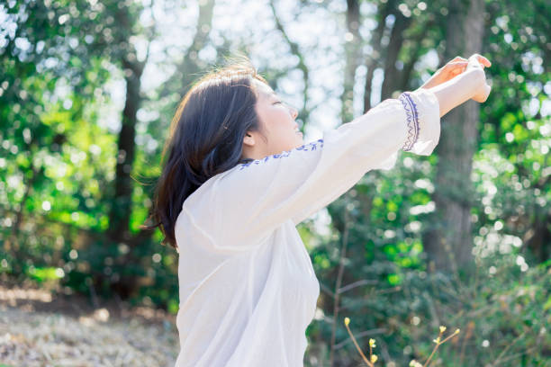istock Young woman relaxing in outdoors. 687951216