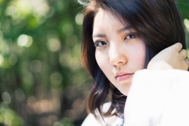 istock Young woman relaxing in outdoors. 687951266