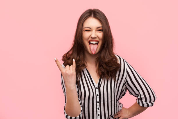 istock Stylish girl gesturing on pink background 687951344