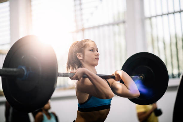 istock Fit girl doing Olympic lift 687968474