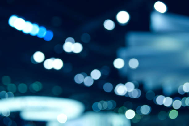 istock Blur light and shadow of light bulb in shopping mall, Abstract background 687969312