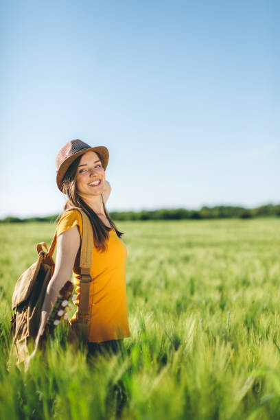 istock Thinking of someone while waltking through medow 687971926