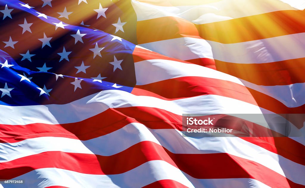 Flag of the USA Flag of the USA with bright sunflare American Flag Stock Photo