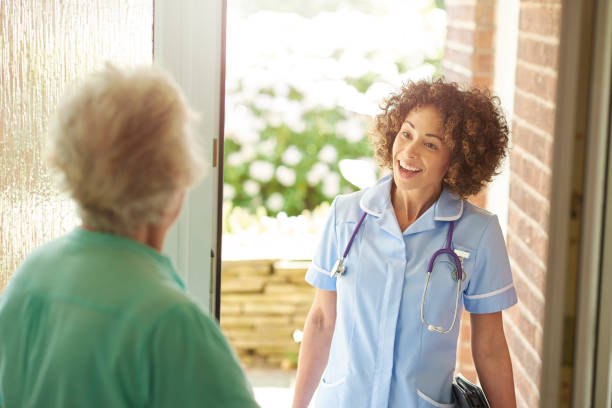 istock nurse house call to senior patient 687980962