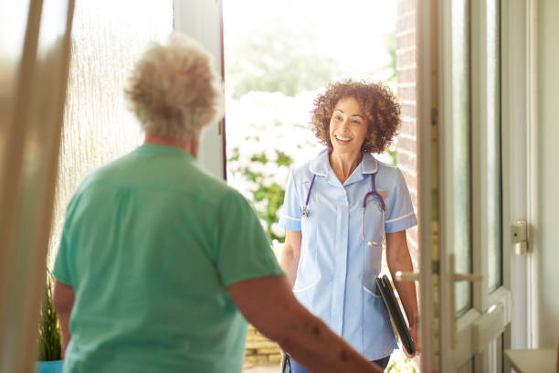 istock nurse house call to senior patient 687981214