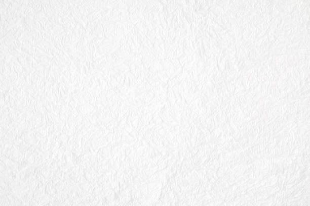 Crumpled white mulberry paper textured background, detail closed up Crumpled white mulberry paper textured background, detail closed up handmade paper stock pictures, royalty-free photos & images