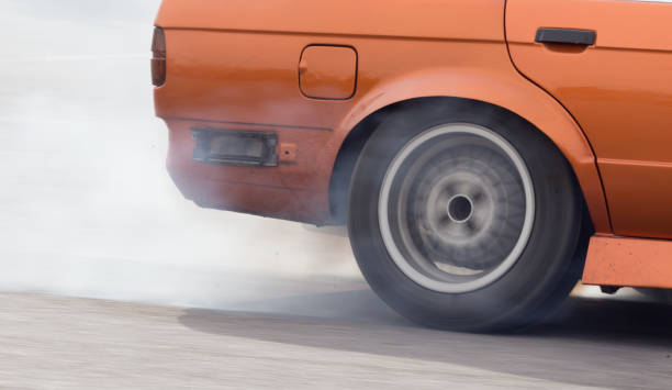 istock Smoke from under the wheels of the car 687987690