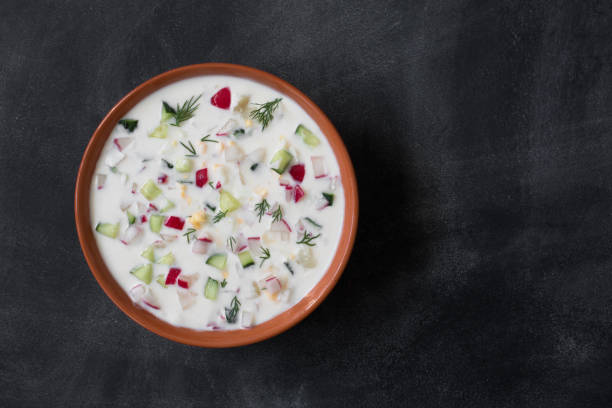 istock Okroshka. Traditional russian Summer yoghurt cold soup with vegetables 687988522