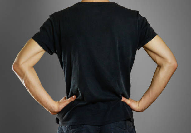 istock Man in blank black t-shirt. Prepared for your layout. Isolated 687994196