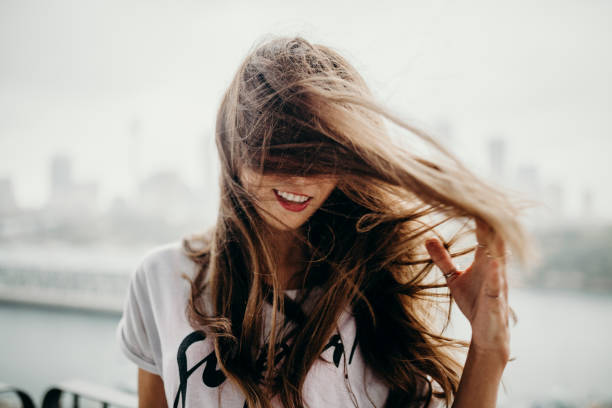 istock Woman moving and touching her haire. 688015418