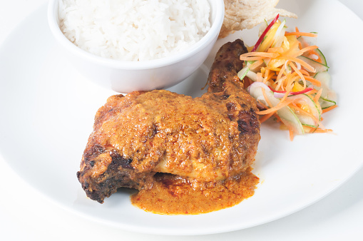 Classic Chicken Rendang with rice and vegetable pickles