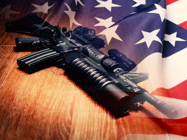istock The Black Rifle with grenade launcher and U.S. flag 688015686
