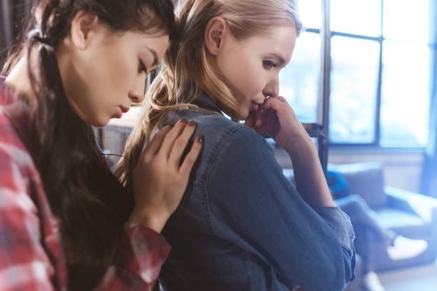 istock woman supporting her girlfriend in depression 688021740