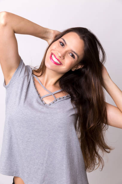 istock Latina girl smiling, studio shot 688021910