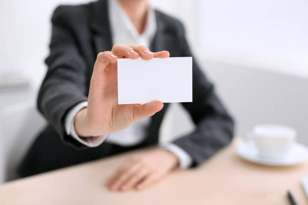 istock Business woman giving visit card 688033318