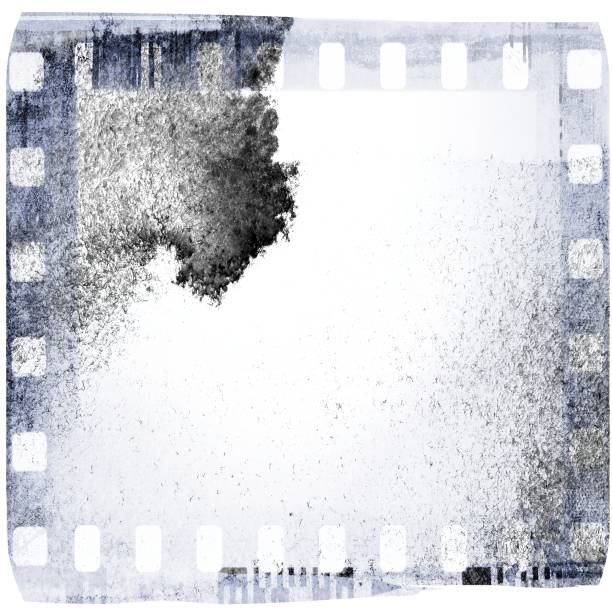 istock Vintage blue film strip frame on old and damaged paper background. 688037384
