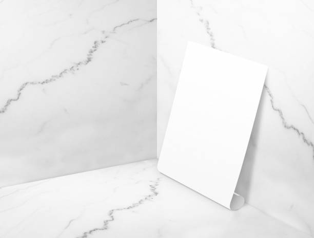 istock Blank white poster at white glossy marble corner studio room background 688038144