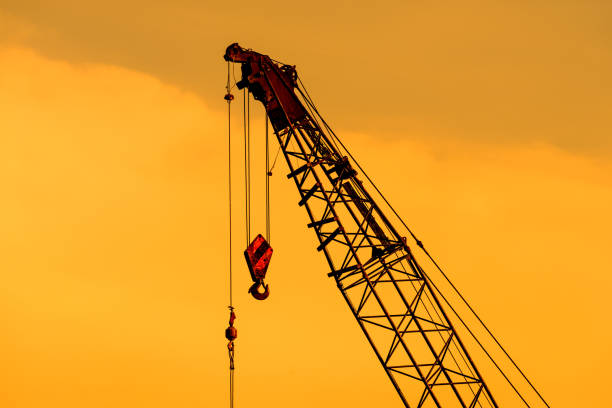 istock Close up of crane at construction site. 688041314