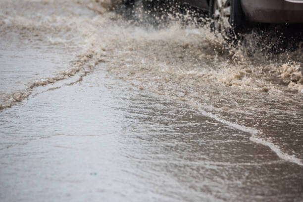 istock dirty water splash after vehicle roaring by 688046678