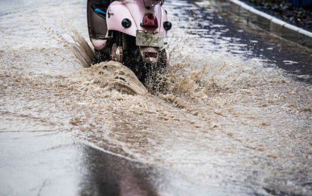 istock dirty water splash after vehicle roaring by 688046776