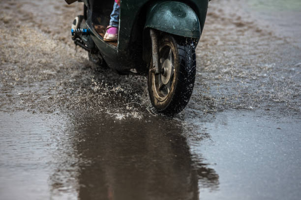 istock dirty water splash after vehicle roaring by 688046790