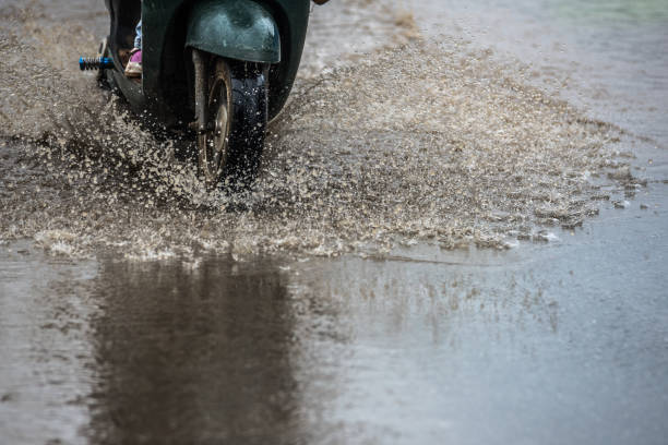 istock dirty water splash after vehicle roaring by 688046794
