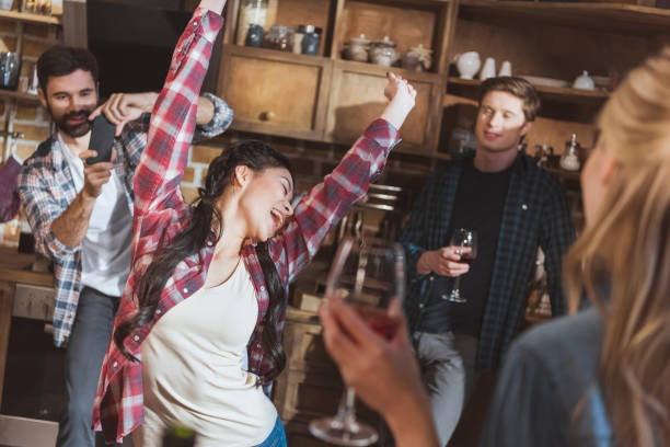 istock people having fun at home party 688049658