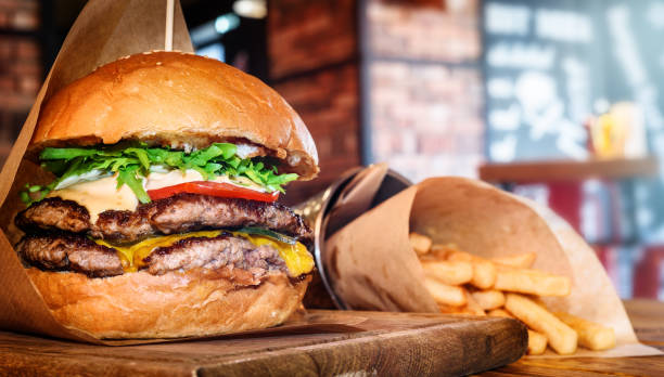 istock Appetizing burger and french fries 688049662