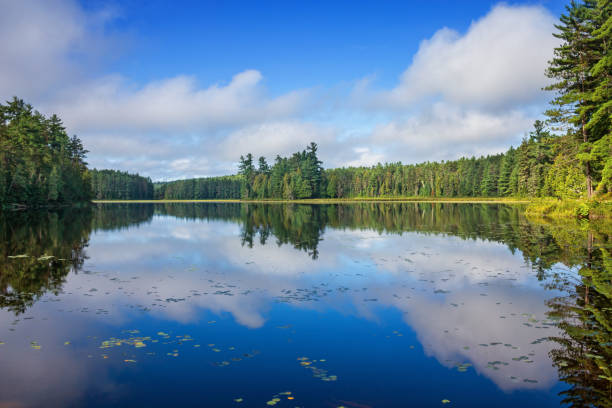 Lake landscape in Algonquin Provincial Park Ontario Canada Landscape stock photograph of calm, beautiful lake  with reflections in Ontario lake country, Algonquin Provincial Park, Canada northern ontario stock pictures, royalty-free photos & images