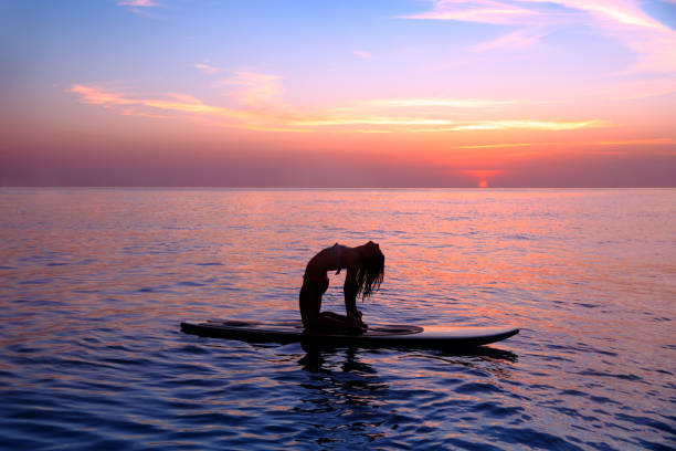 istock Woman doing yoga exercise 688053940