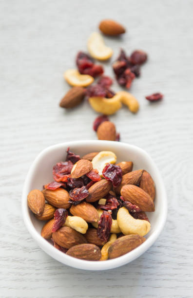 istock Healthy mix nuts on wooden background. 688057598
