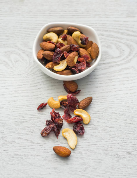 istock Healthy mix nuts on wooden background. 688057808