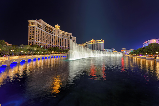 Las Vegas, USA - July 5 2016: View at one of Las Vegas famous landmarks, the Bellagio Hotel fountain show. It is a free show where dancing water fountains are synchronized to music. It takes place every half-hour in the afternoon and, from 8 p.m. until midnight, every 15 minutes. People are not present in the image.