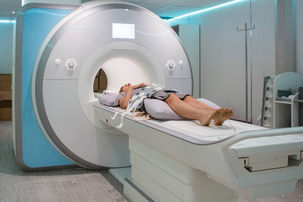 istock Female patient going for an MRI Scan 688090156