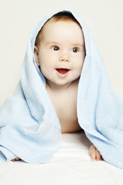 istock Baby after bath, parental care concept 688090348