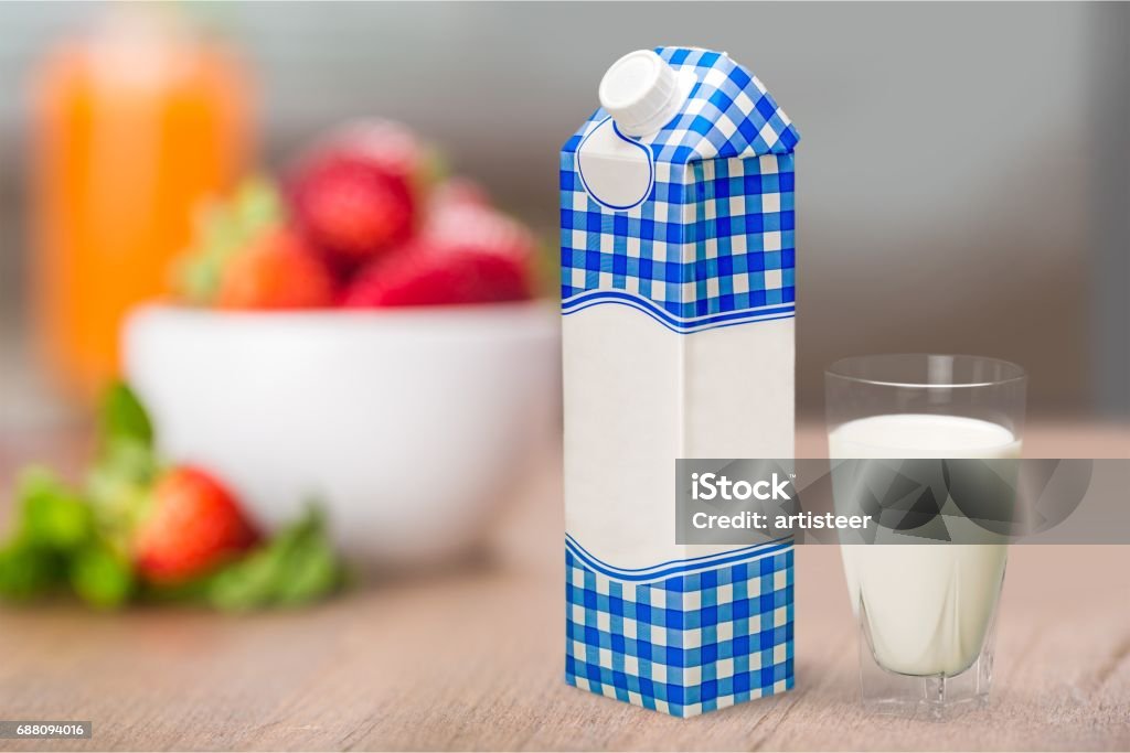 Milk. Glass of milk and box on  background Breakfast Stock Photo