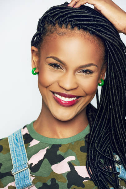 istock Beautiful young African woman with a beaming smile 688095412